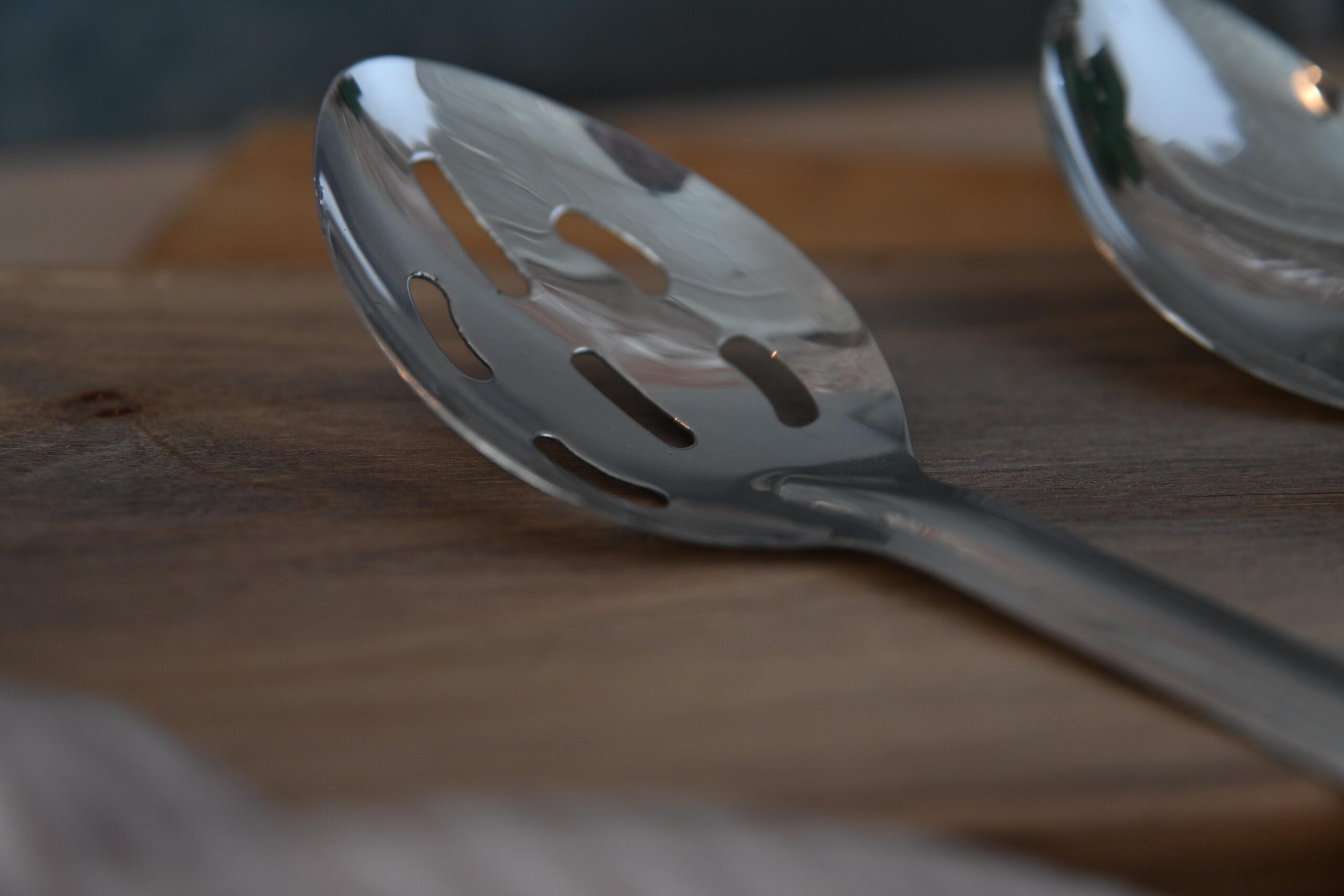 Slotted Stainless Steel Serving Spoon with Grooved Handle – Medium - Image 2